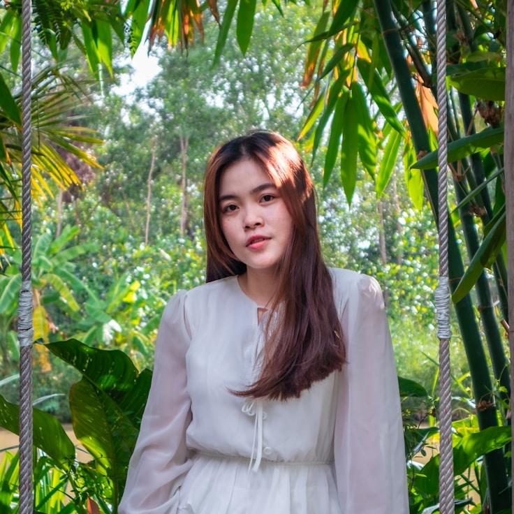 Kaveri Mehta, Lead Design Curator at BalancedForwardRoute, reviewing corporate floral arrangements